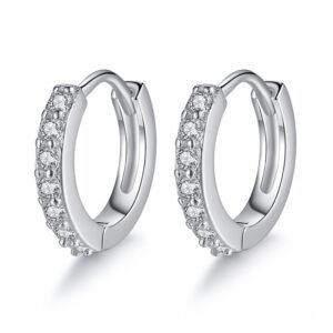 Detailed view of round zircon-studded silver hoop earrings