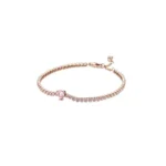 Rose gold tennis bracelet with pink heart centre stone and pink sparkling crystals