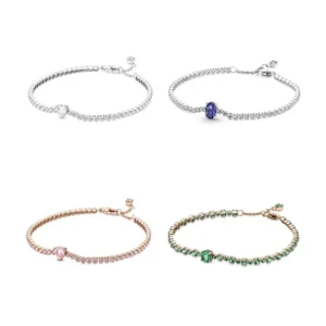 Collection of four sparkling tennis bracelets in silver, blue, rose gold pink and green